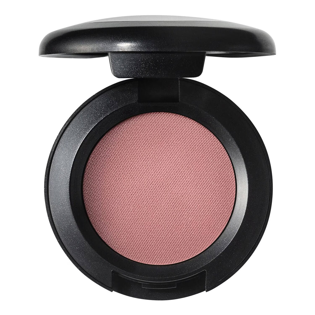 An open round makeup compact showing a pressed blush in a dusty rose pink shade, housed in a black casing with the lid propped open above, on a plain white background.
