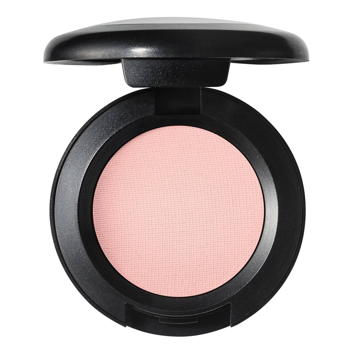 An open round makeup compact with a black casing and a light pink pressed powder pan, shown on a plain white background.