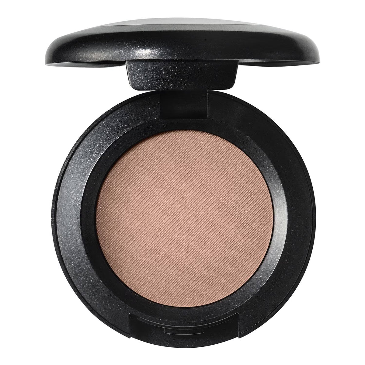 An open round makeup compact with a black casing and a textured, light tan-beige pressed powder pan, shown against a plain white background.