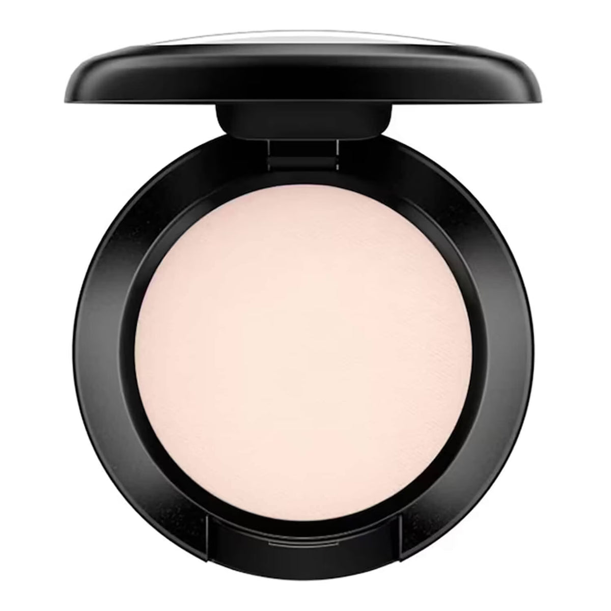 An open round makeup compact with a black casing and a smooth, light peach-beige pressed powder center, shown on a plain white background.