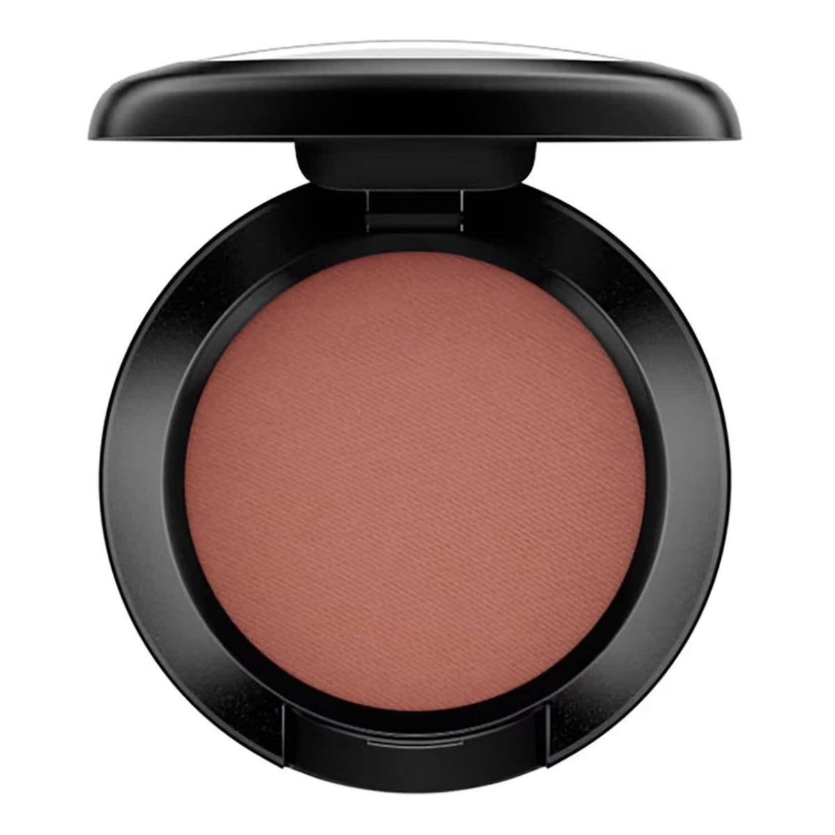 An open round makeup compact showing a pressed powder blush in a warm peachy rose shade, set in a glossy black compact against a plain white background.