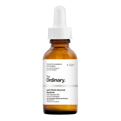 Brown glass bottle with white dropper labeled 'The Ordinary' on a white background