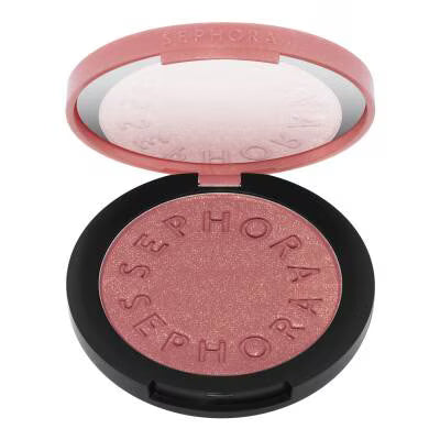 Sephora Shady Sands eyeshadow in a circular compact, shown open with the mirror on the lid, revealing a shimmery dusty rose pink shadow.