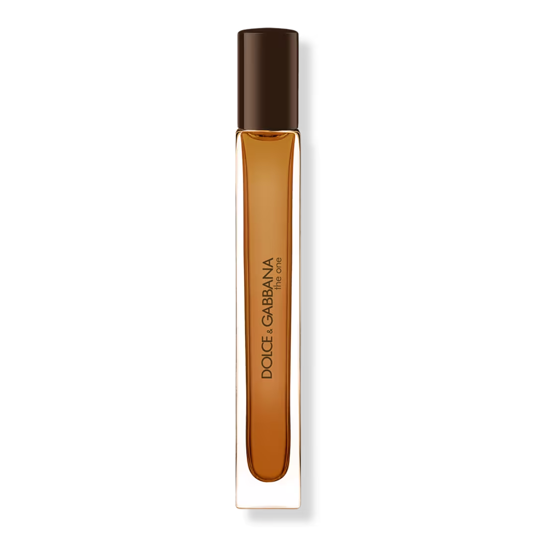 Dolce Garbana Eau de Toilette spray bottle with amber liquid and a dark brown cap, shown on a clean white background.
