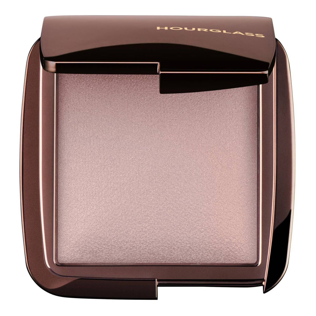 Hourglass powder compact in a square metallic bronze case, showing a shimmering light pink pressed powder inside, on a solid white background.