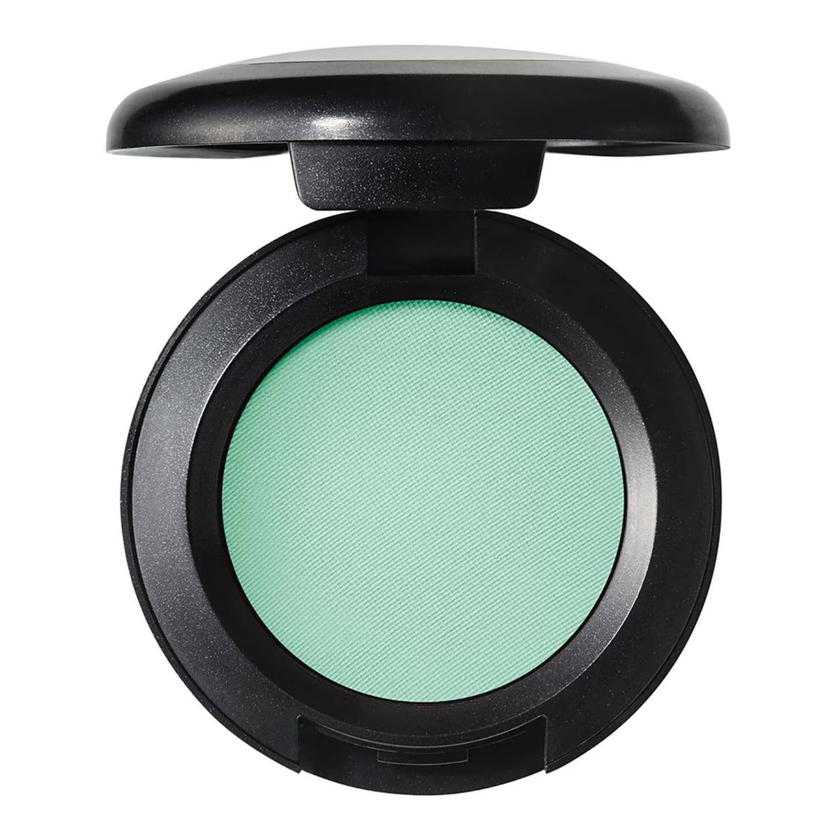An open round makeup compact with a black casing and a light mint green pressed powder pan, shown on a plain white background.