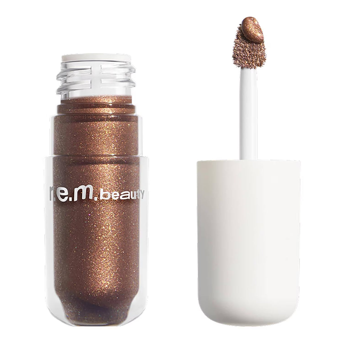 A clear cosmetic bottle filled with shimmery bronze-brown glitter makeup, shown next to its white applicator wand with a dollop of the product on the tip. The brand name 're.