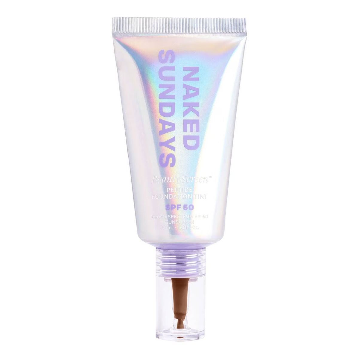 An iridescent holographic squeeze tube of Naked Sundays Prime Defense Sunscreen Mist SPF 50, featuring a clear cap with a brown spray nozzle, on a solid white background.