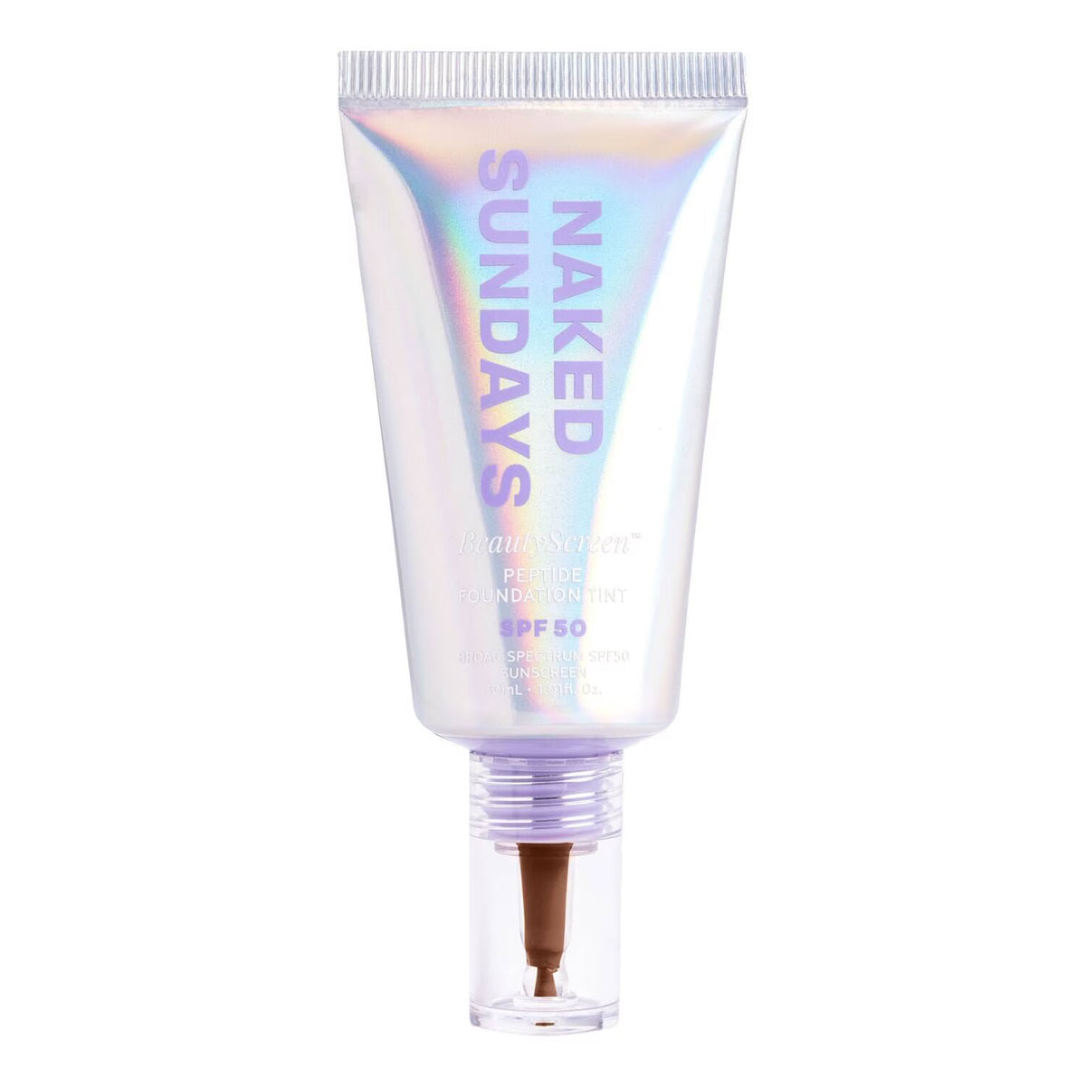 An iridescent holographic squeeze tube of Naked Sundays Peeling Perfume Foundation SPF 50, featuring a clear cap with a brown applicator tip, on a solid white background.