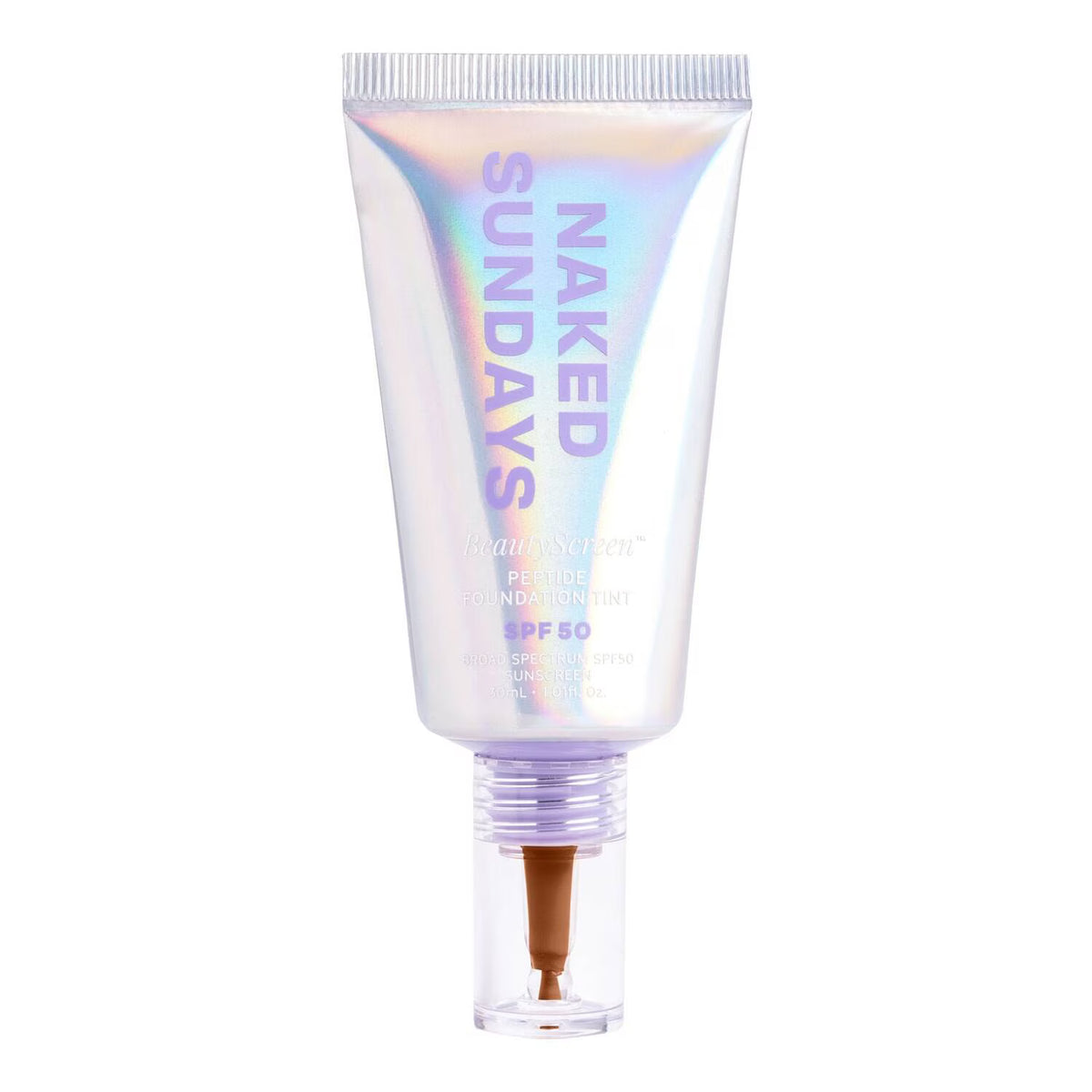 An iridescent holographic squeeze tube of Naked Sundays Prime Foundation with a clear cap showing the brown formula inside, on a solid white background.