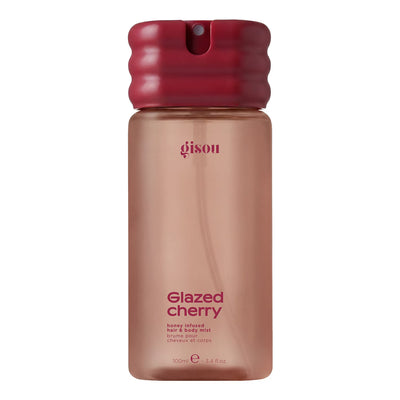 A 100ml bottle of Gison Glazed Cherry body mist, featuring a translucent dusty rose-pink bottle and a dark red ribbed cap, shown on a plain white background.