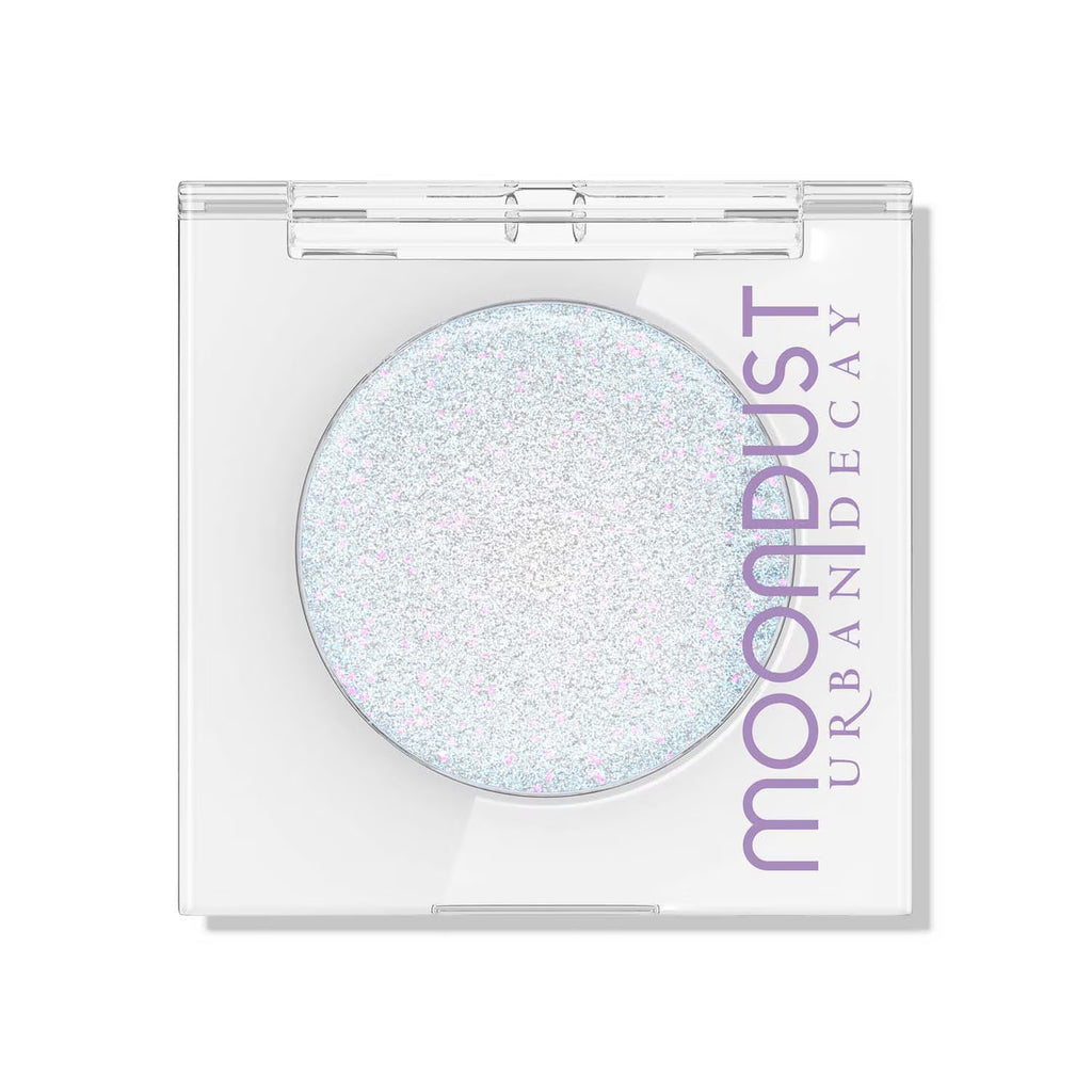 Urban Decay Moondust eyeshadow in a clear case on a white background
