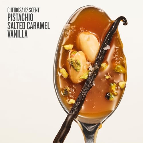 Spoon with salted caramel, vanilla bean, and pistachios on a white background