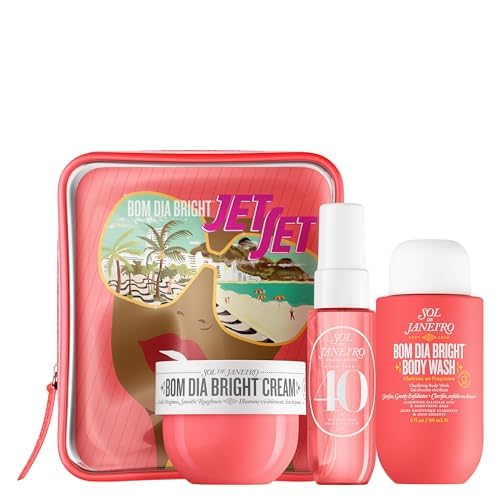 Skincare product set with 'Bom Dia Bright' cream, lotion, and body wash in a pink travel case on a white background.