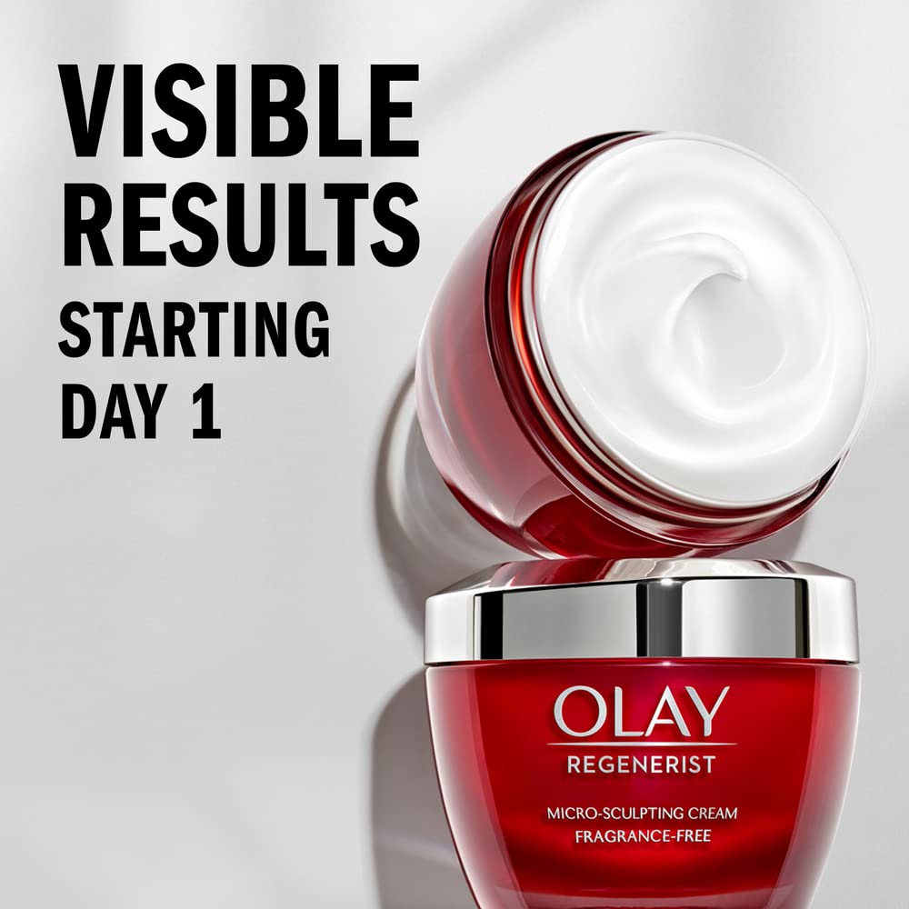 Red Olay Regenerist cream jar with visible results text on a gray background