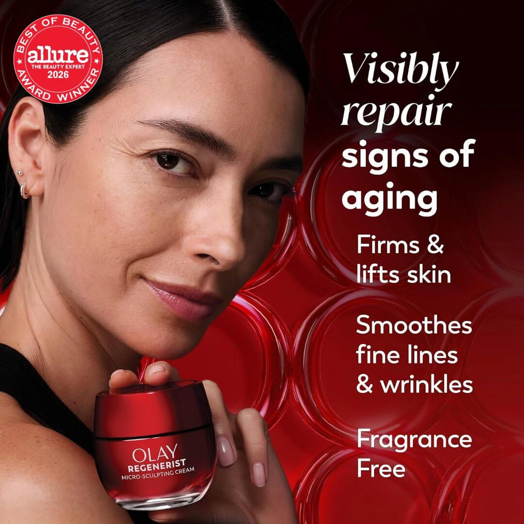 A beauty advertisement featuring a woman holding an Olay Regencist Night Repair Cream jar against a dark red background with text about signs of aging. An Allure award badge is visible in the top left corner.