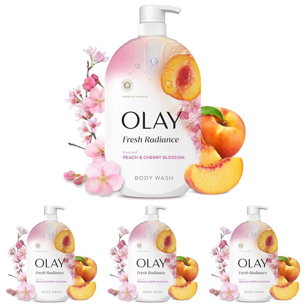 Five bottles of Olay Fresh Radiance body wash in Peach & Cherry Blossom scent, arranged with peach slices and pink cherry blossoms on a white background.