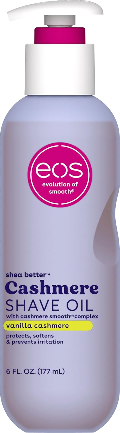 A bottle of EOS Cashmere Shave Oil in vanilla cashmere scent, featuring a lavender bottle, white pump, and a bright pink circular logo on a white background.