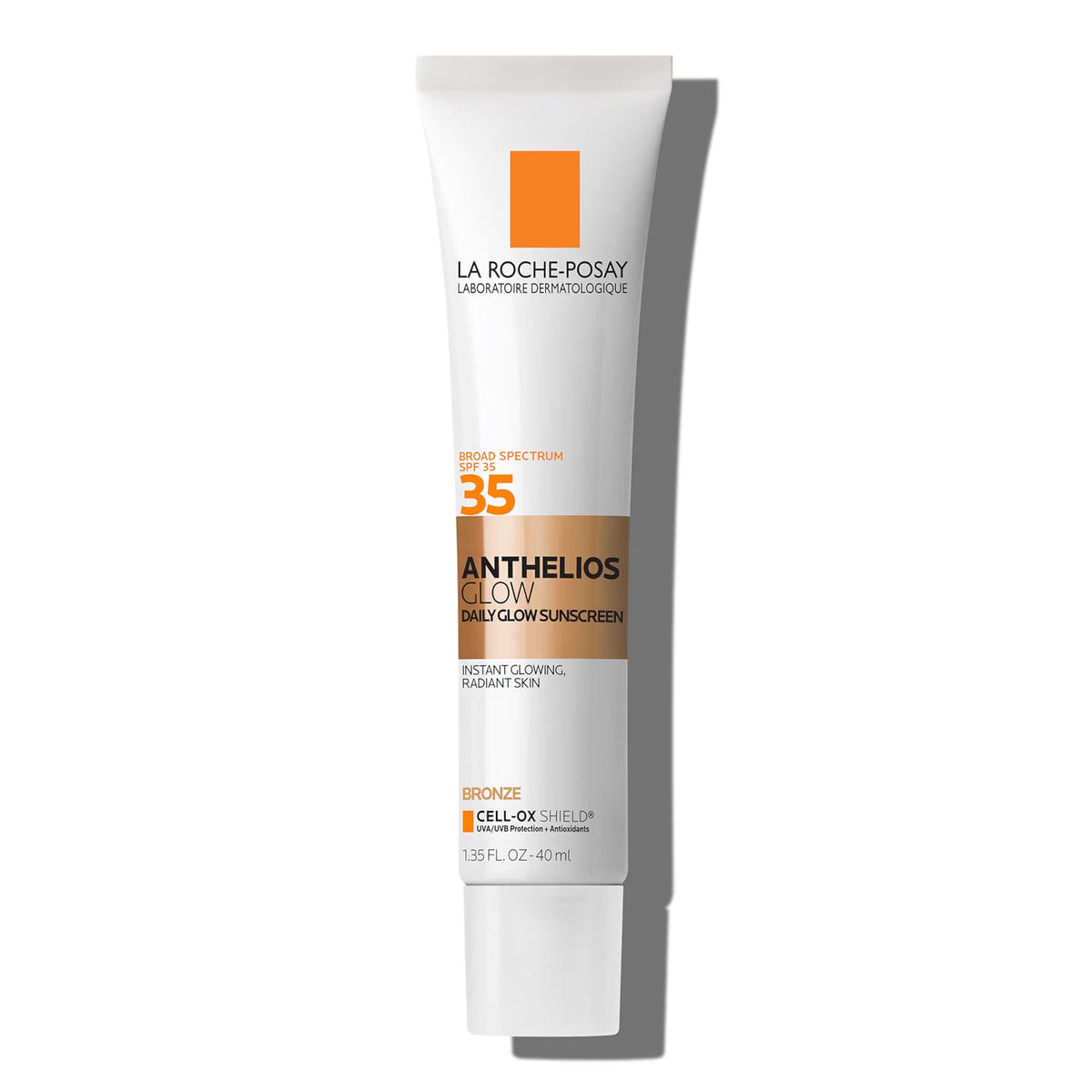 La Roche-Posay Anthelios Glow Daily Glow Sunscreen SPF 35 sunscreen tube in bronze featuring a white tube with orange and black text, set against a clean white background with a soft shadow.