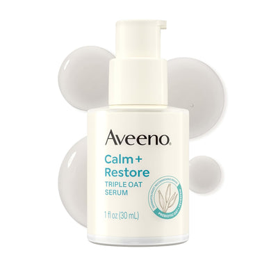 Aveeno Calm + Restore Triple Oat Serum bottle on a white background