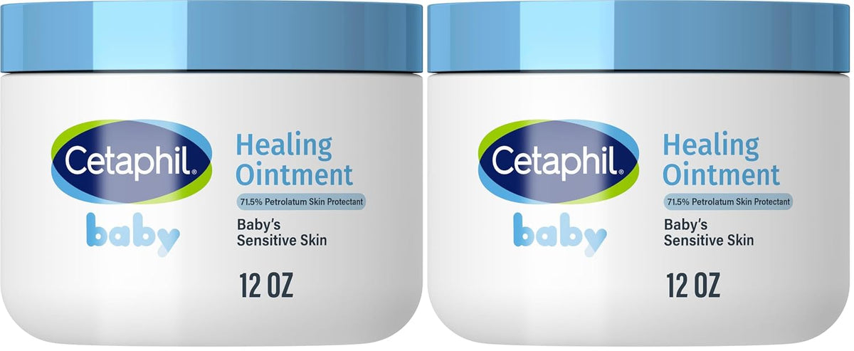 Two white jars of Cetaphil Healing Ointment for baby's sensitive skin, each with a light blue lid, shown side by side on a white background.