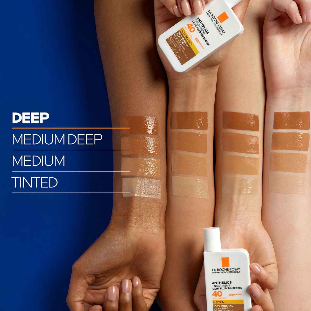 Hands holding sunscreen bottles with color swatches on skin tones.