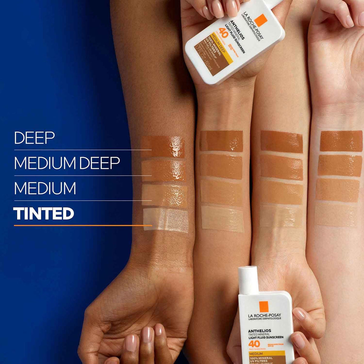 La Roche-Posay sunscreen bottles with swatches on skin for different tones.