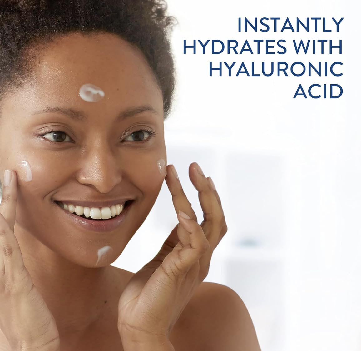 Woman applying cream to her face with text 'Instantly hydrates with hyaluronic acid' on a white background