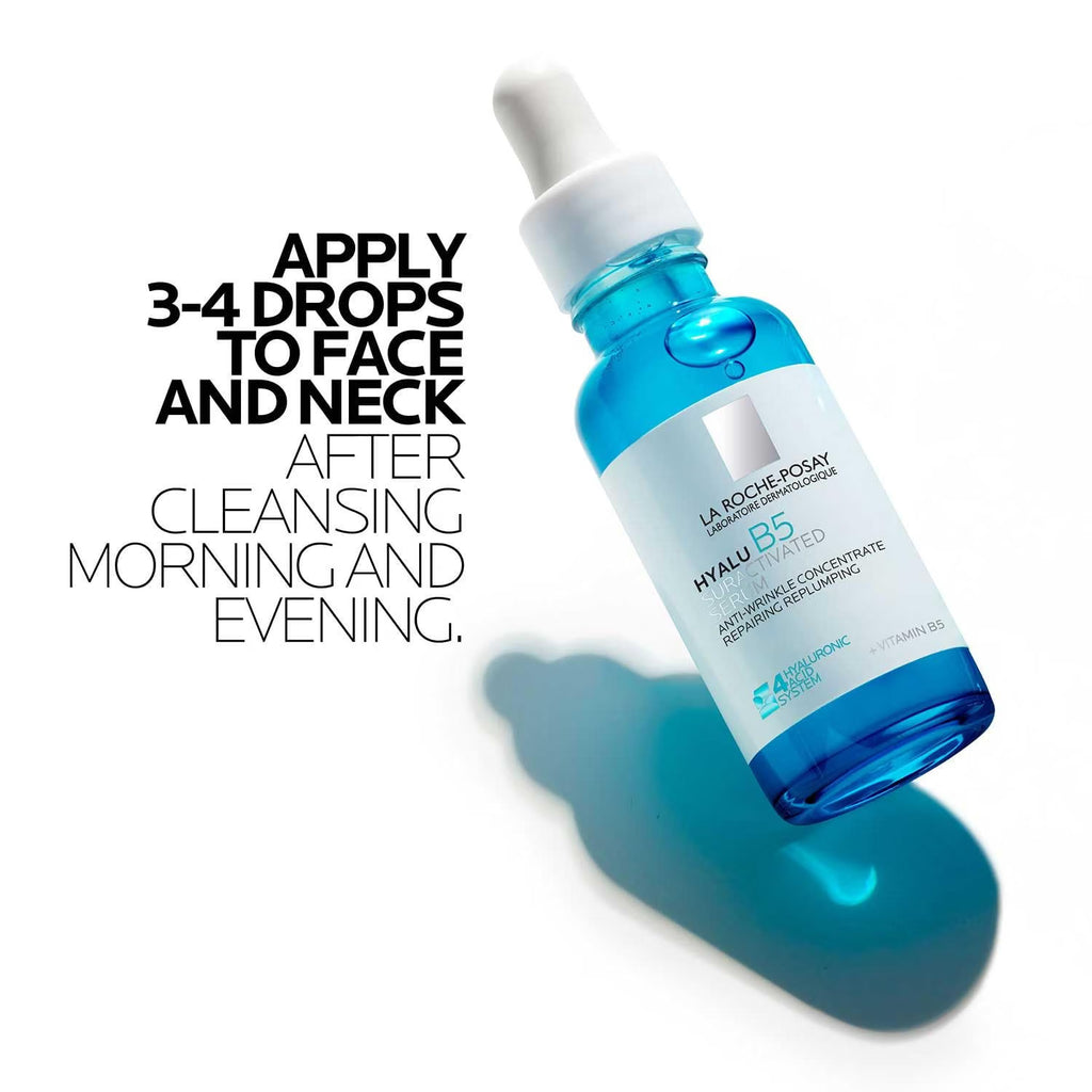 Skincare serum bottle with blue liquid on a white background