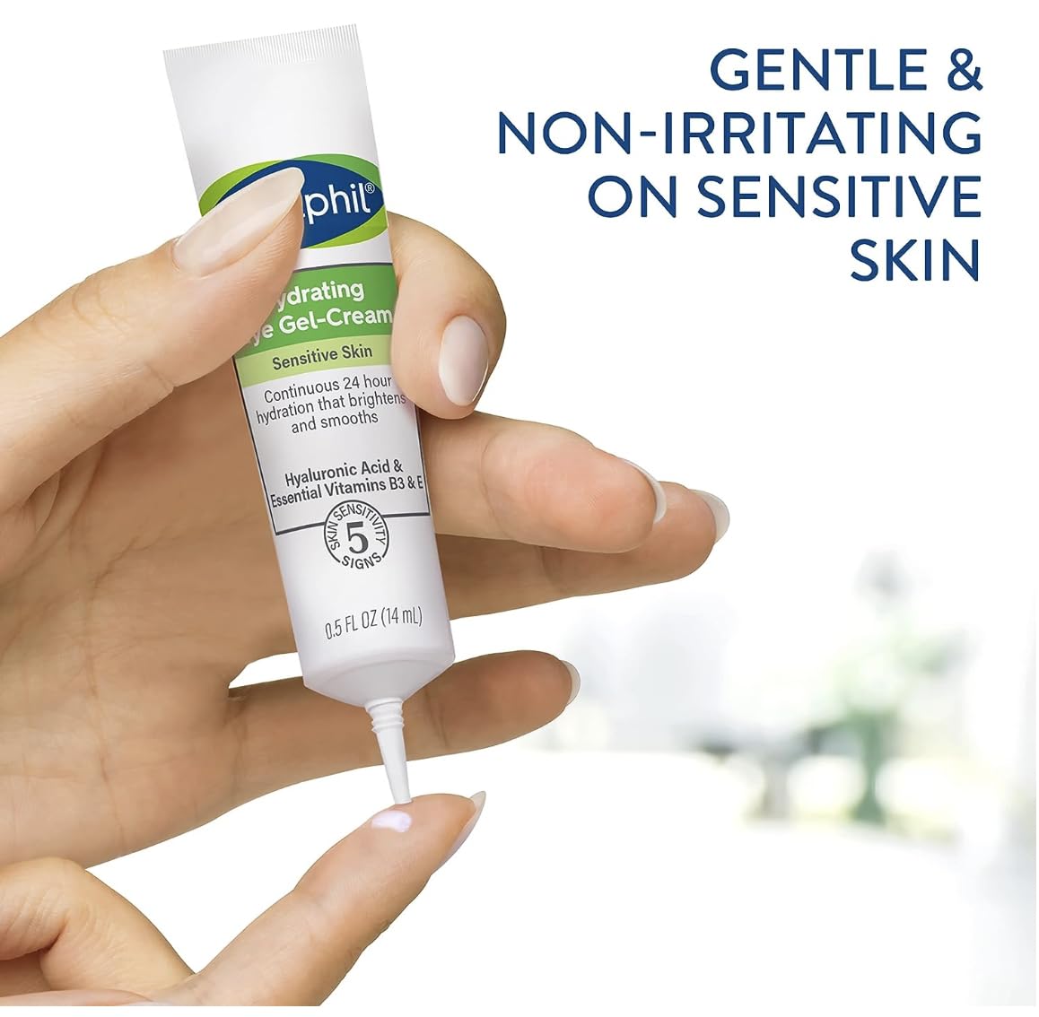 Hand holding a tube of gel-cream with text indicating it's gentle on sensitive skin.
