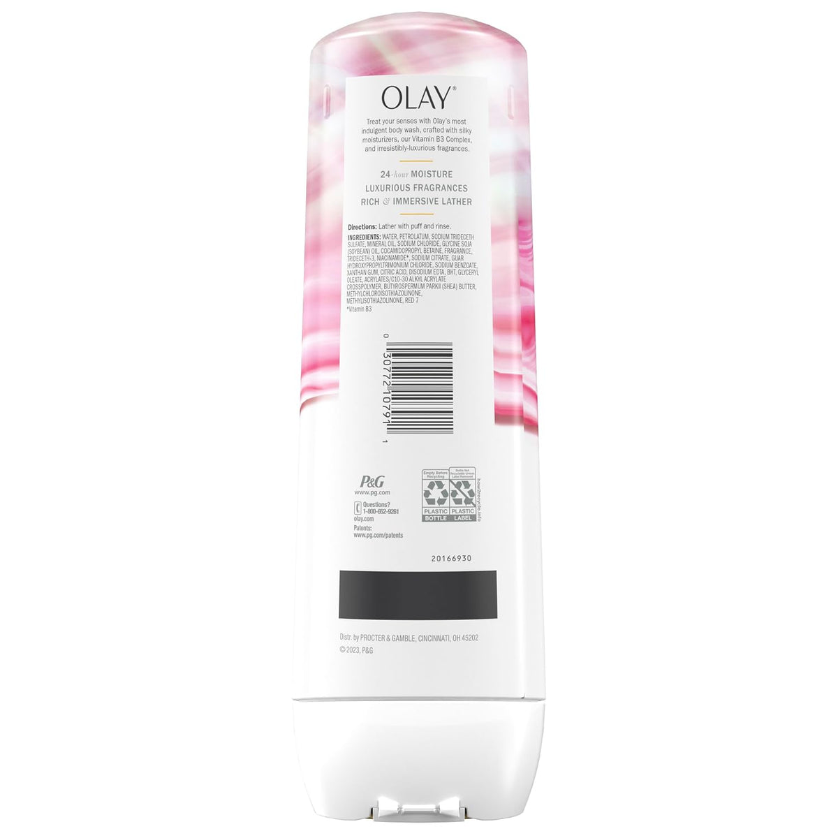 Olay lotion bottle with floral design on a white background