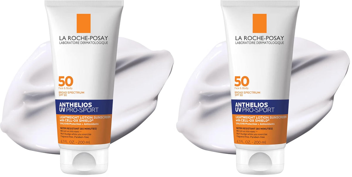 Two tubes of La Roche-Posay Anthelios Ultra Sport SPF 50 sunscreen shown side by side, each in front of a white cream smear on a white background.