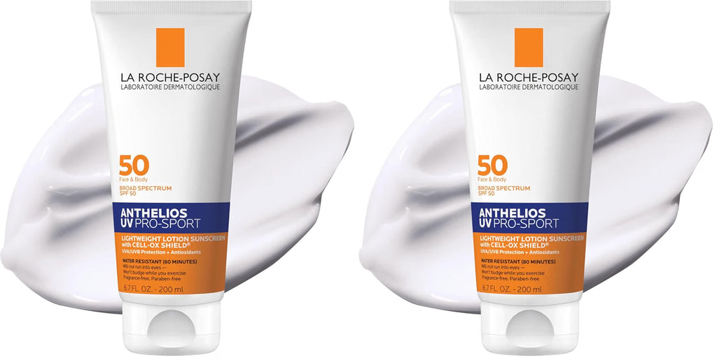 Two tubes of La Roche-Posay Anthelios Ultra Sport SPF 50 sunscreen shown side by side, each in front of a white cream smear on a white background.