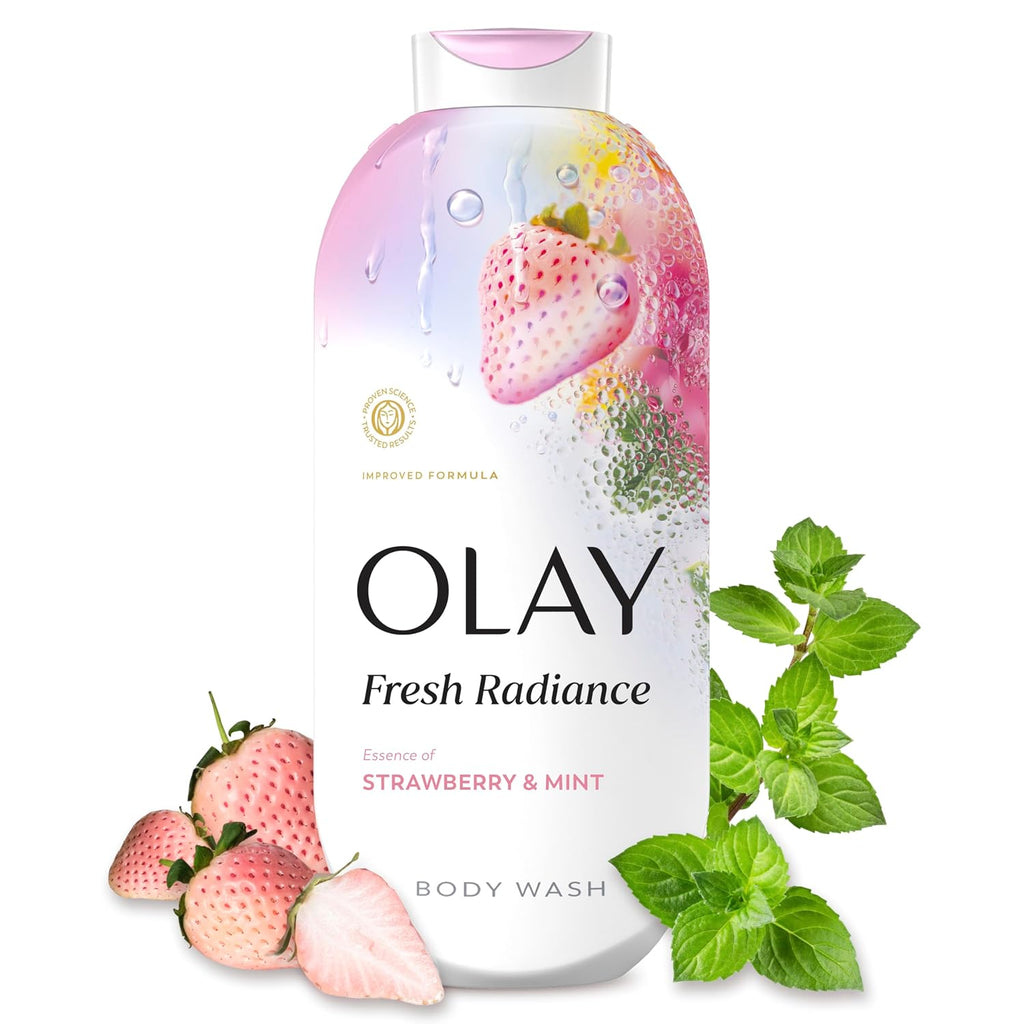 Olay Fresh Radiance body wash bottle in Strawberry & Mint scent, decorated with fresh strawberries and mint leaves on a white background.