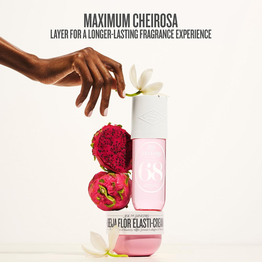A perfume bottle labeled '68' and 'Delia Flor Elasti-Cream' stands on a white surface against a white background, with a hand placing a white flower on top. Two pink dragon fruit fruits and a small white flower are arranged around it.