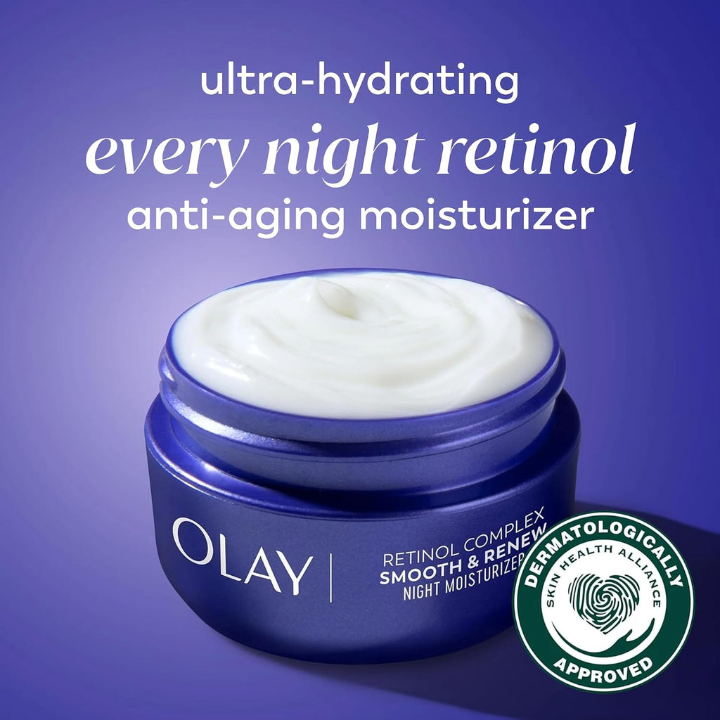 Olay ultra-hydrating every night retinol anti-aging moisturizer in a dark blue jar with white cream visible inside, set against a purple gradient background with product text and a dermatologically approved seal.