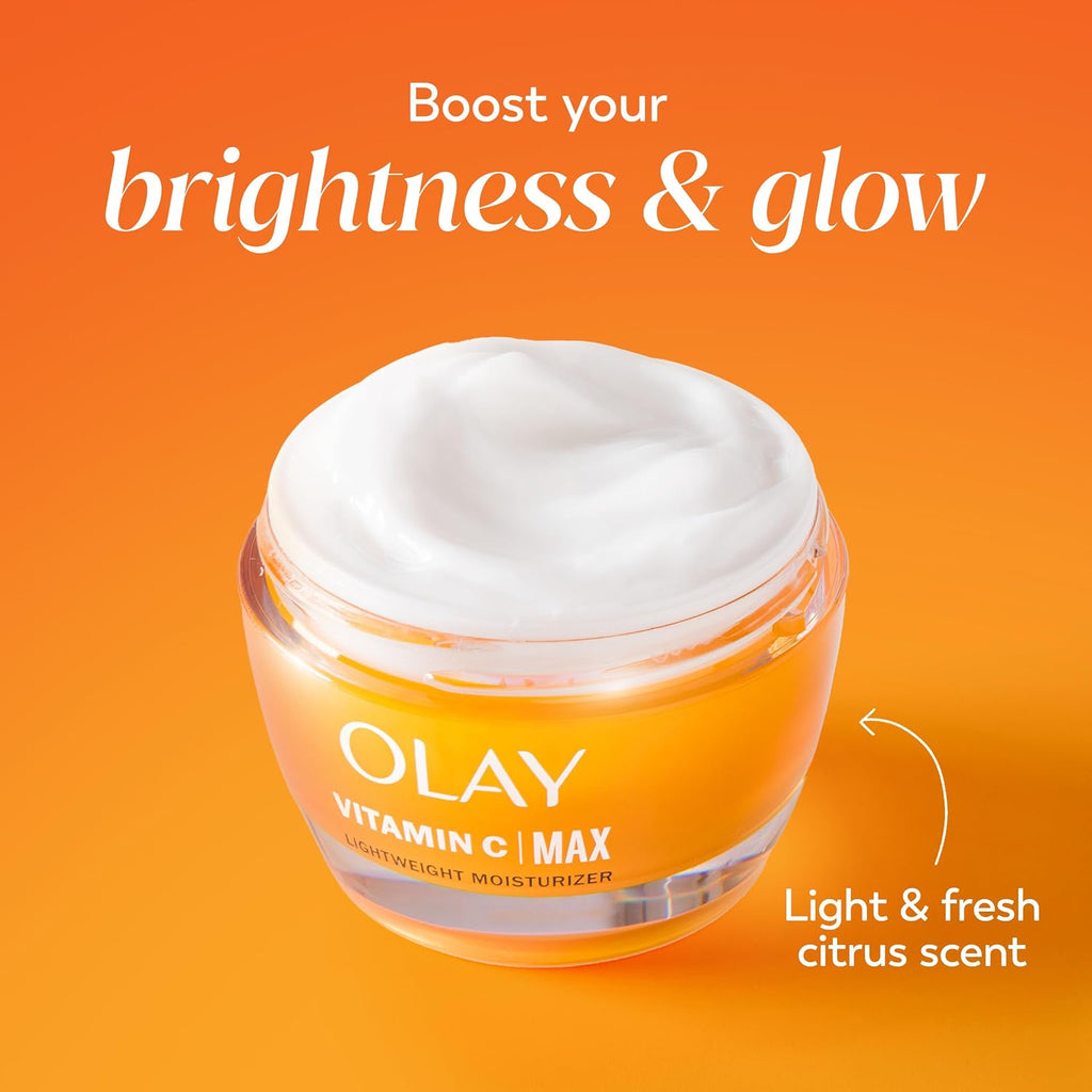 Olay Vitamin C Max moisturizer jar with whipped cream on an orange background