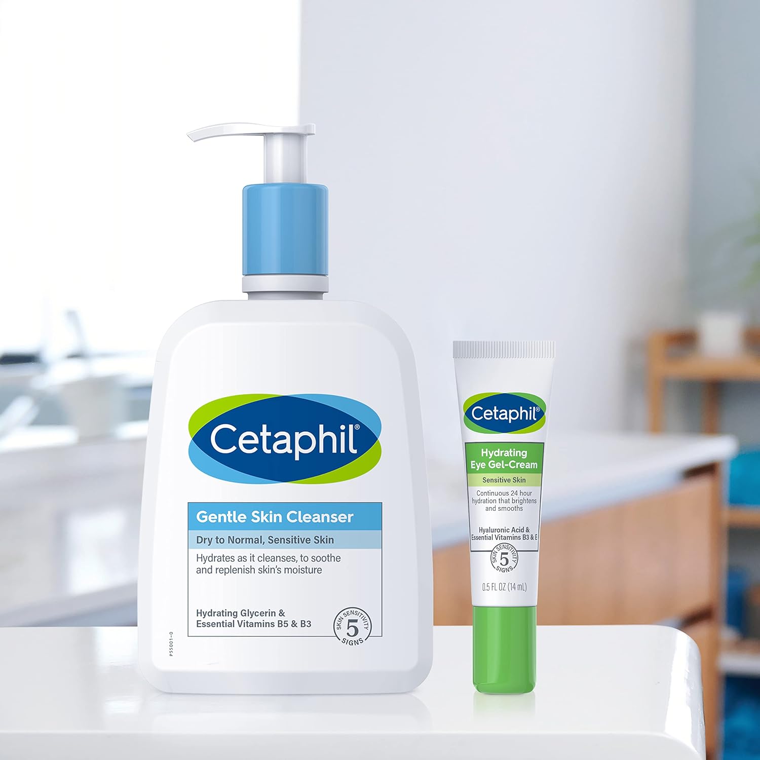 Cetaphil Gentle Skin Cleanser and Hydrating Eye Gel Cream on a white surface with a blurred indoor background.