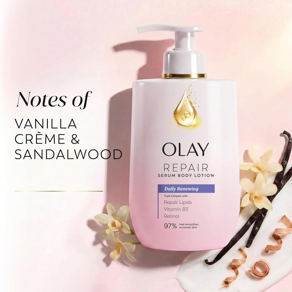 Olay Repair Serum Body Lotion bottle in a soft pink and white design with a gold-accented pump, styled on a pale pink background with vanilla beans, cream flowers, and text reading 'Notes of Vanilla Crème & Sandalwood'.
