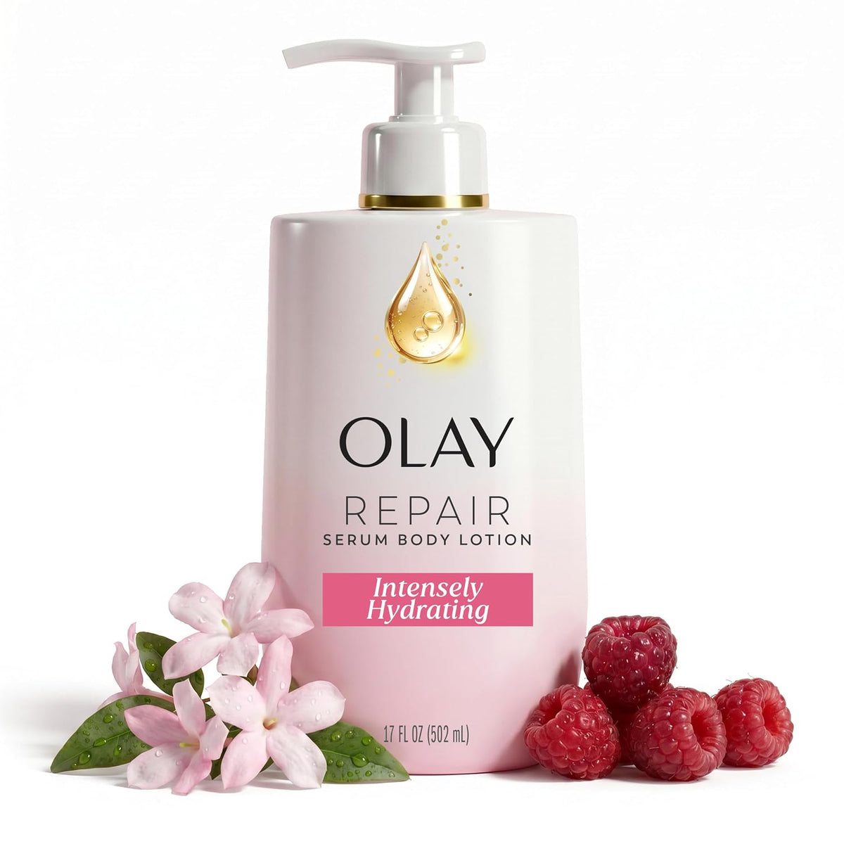 Olay Repair Serum Body Lotion in a white pump bottle with a pink gradient base and gold droplet logo, styled with pink blossoms and raspberries on a white background.
