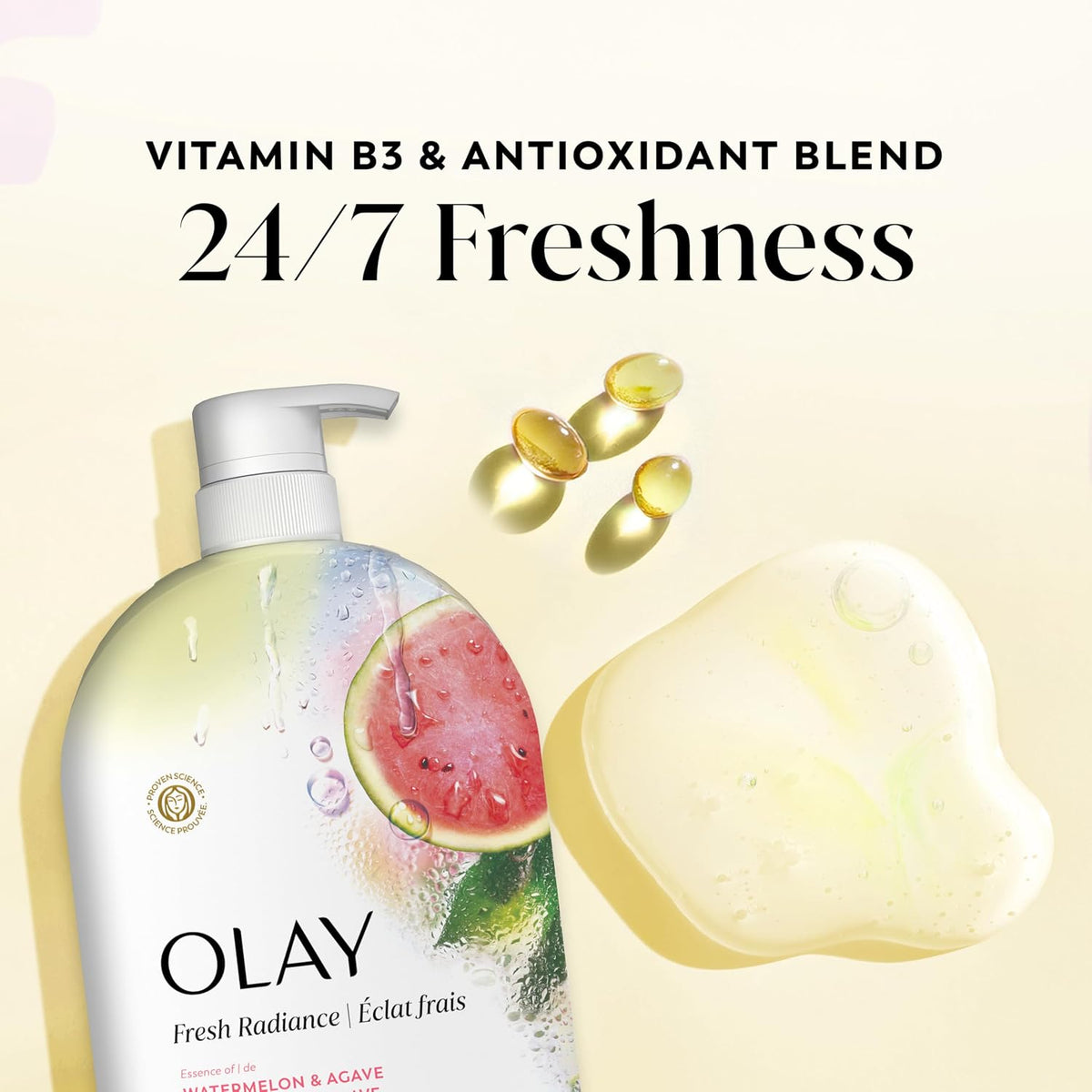 OLAY skincare product with watermelon and agave ingredients, vitamin pills, and '24/7 Freshness' text on a light background.