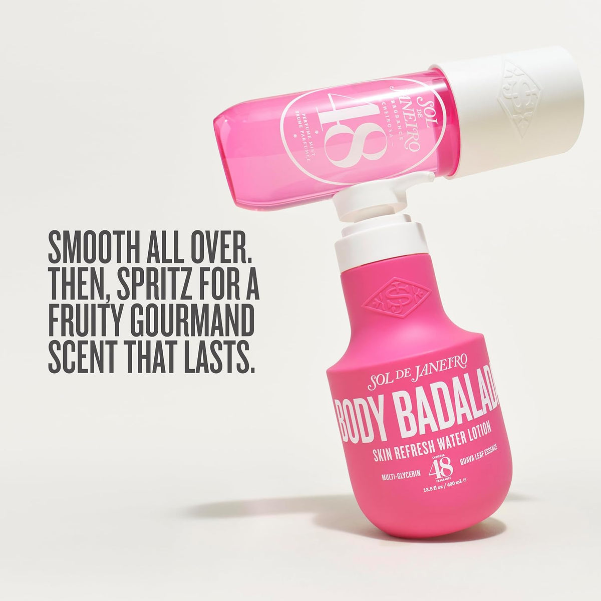 Two pink and white Jol de Janeiro Body Badaloo skin refresh water lotions arranged in a creative stacked composition on a light gray background, with promotional text on the left.
