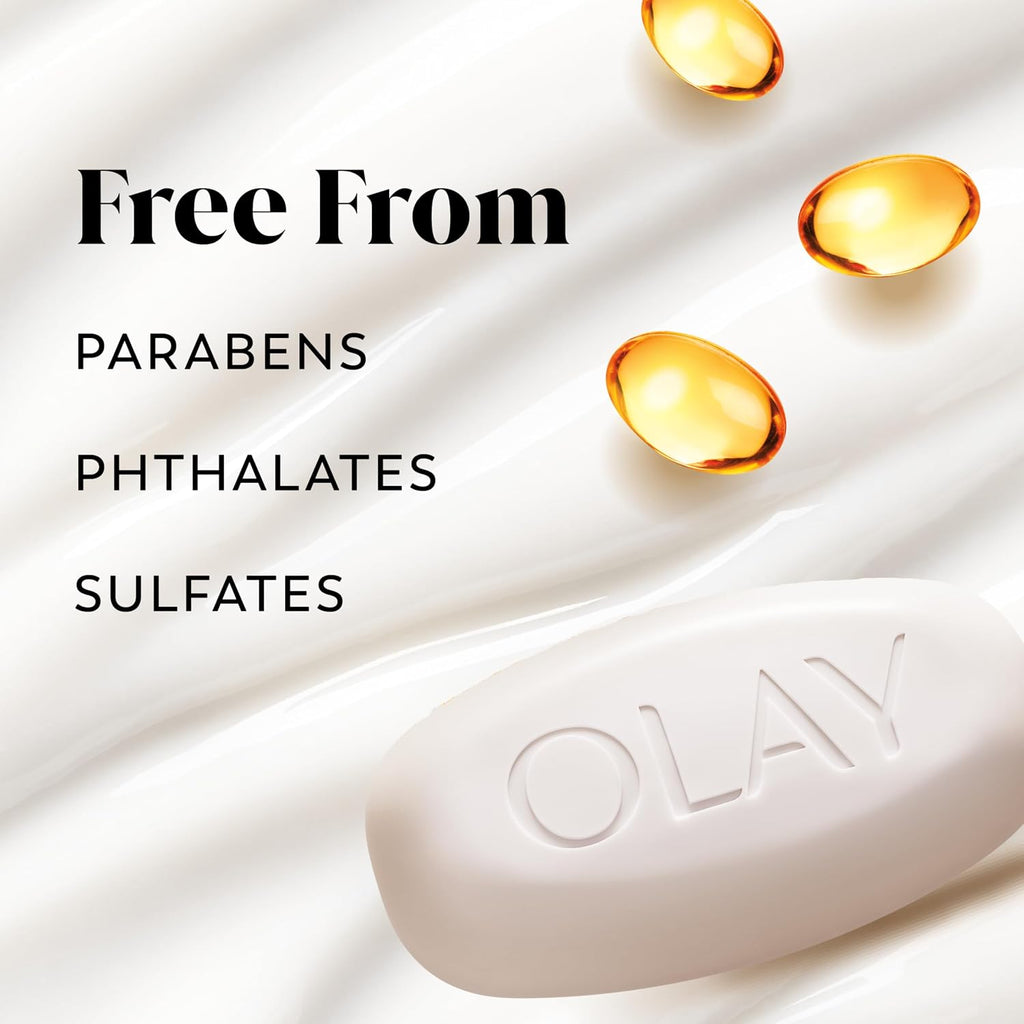 Olay soap bar with yellow capsules on a white background, featuring text indicating 'Free From' parabens, phthalates, and sulfates.