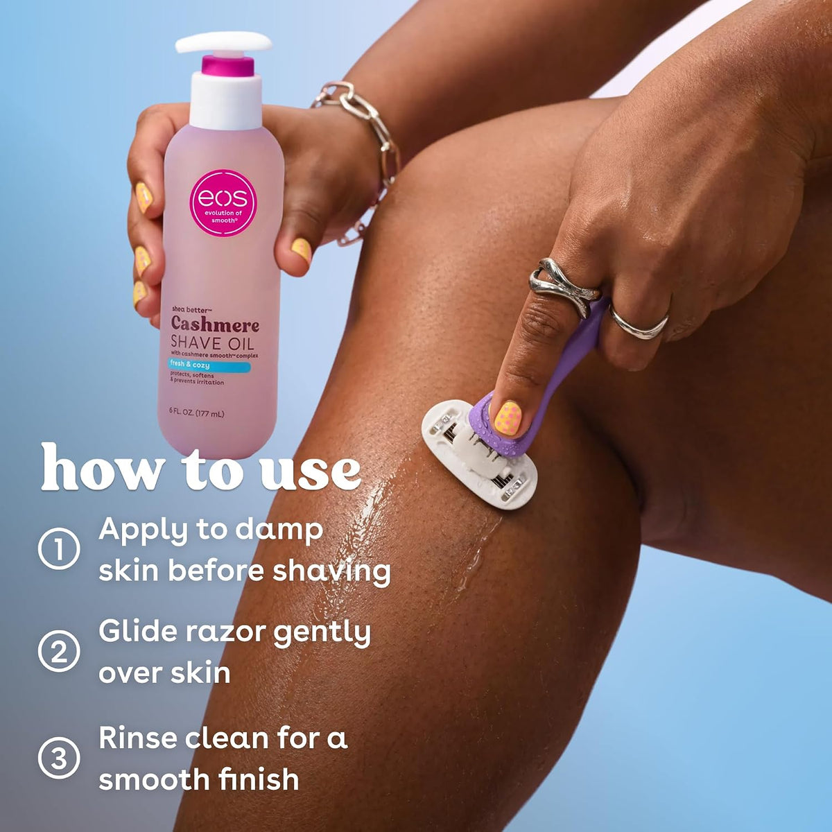 A person shaving their leg with a purple-handled razor while holding a bottle of EOS Cashmere Shave Oil. White text on the left reads 'how to use' with three steps for applying the product to damp skin before shaving, against a light blue background.