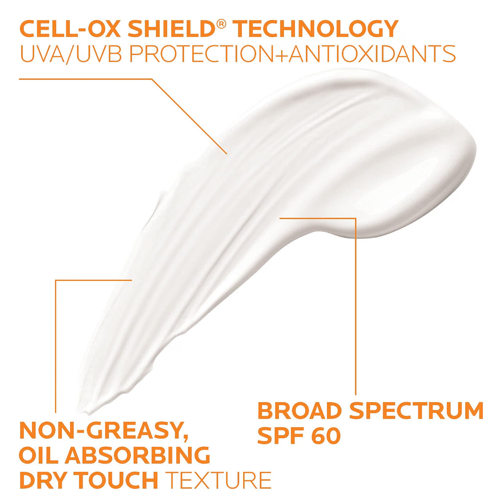 A white cream product smear on a white background with orange text callouts describing Cell-Ox Shield technology, broad spectrum SPF 60, and non-greasy, oil-absorbing, dry touch texture.