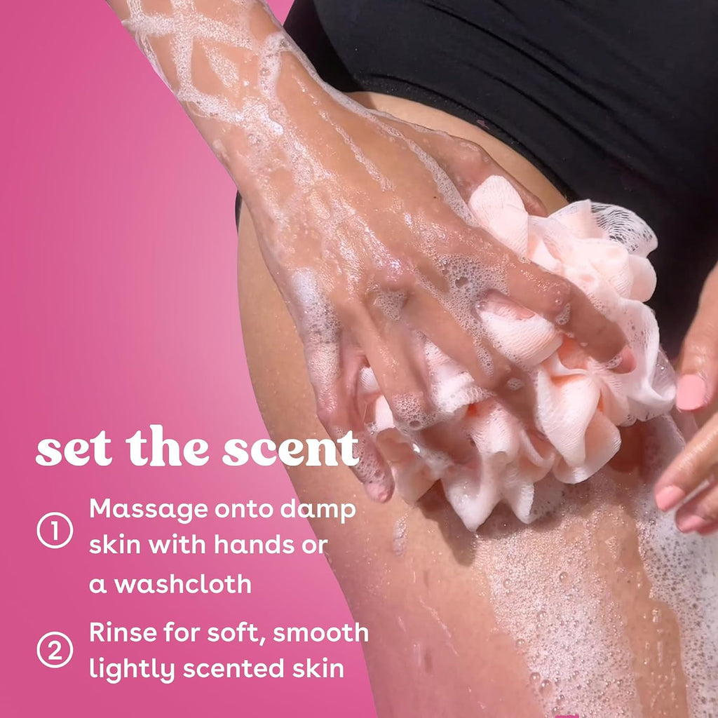 Person applying soap to their leg with a pink background and text instructions.