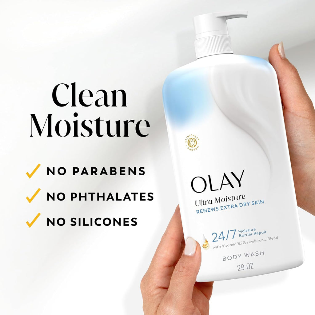Olay body wash bottle held by a hand with product features listed on a white background