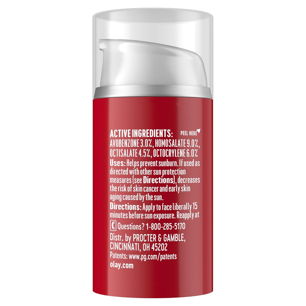 A red cosmetic pump bottle with a clear cap, showing the back side with white text detailing ingredients and directions. The brand Olay is visible at the bottom.