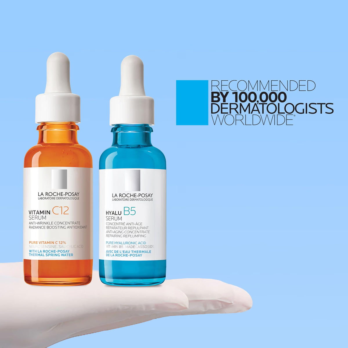 Two La Roche-Posay skincare serum bottles on a white surface with a blue background.