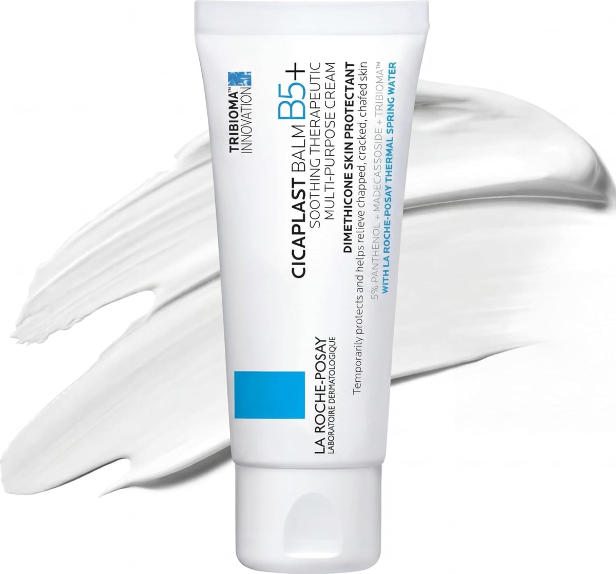 La Roche-Posay Tribioma Innovator Cicaplast Balm B5+ soothing skin protectant in a white squeeze tube, shown against a white background with a white cream smear behind it.